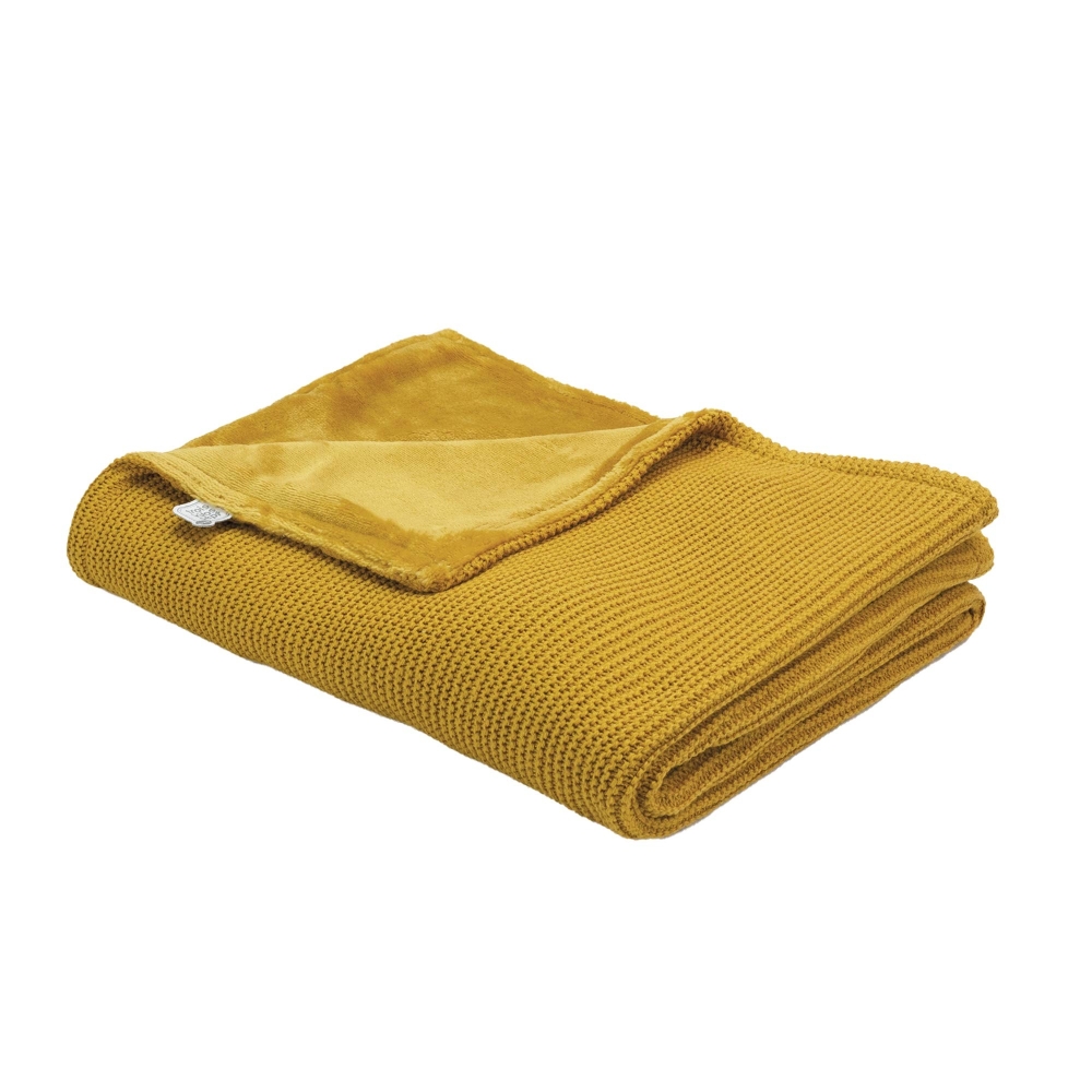 Focus sur la couverture moutarde Focus sur la couverture moutarde
