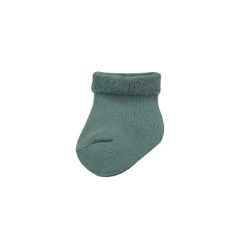 Zoom sur les chaussettes olive foncé