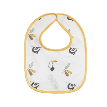 Close-up of the white and mustard bib with sloths and pelicans