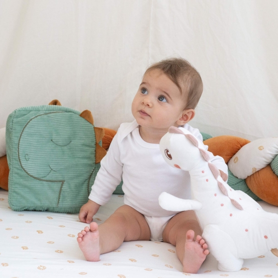 Peluche musicale bambina dinosauro