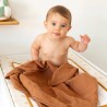 Baby in terracotta swaddle Baby in terracotta swaddle