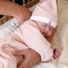Baby with pink newborn hat Baby with pink newborn hat