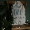 Spielzeugsack neben dem Tannenbaum Spielzeugsack neben dem Tannenbaum