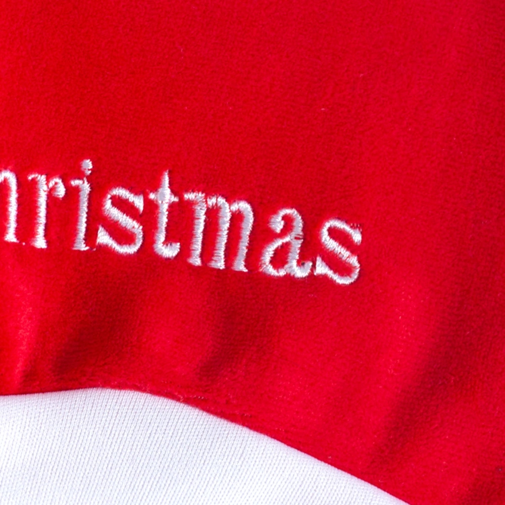 material e cor vermelha do gorro de Natal para bebé