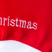 material e cor vermelha do gorro de Natal para bebé
