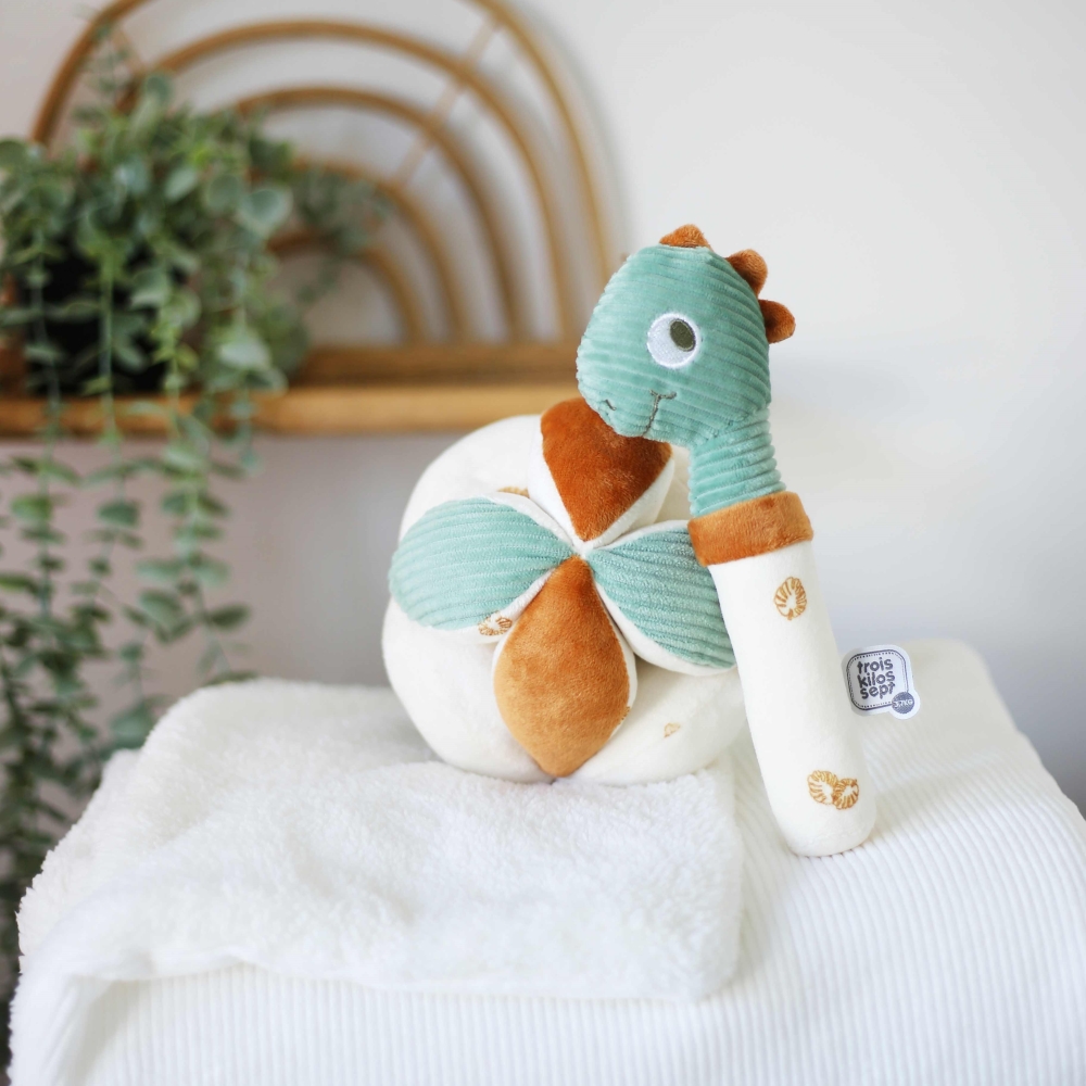 Brinquedo de apertar em forma de dinossauro com bola sensorial