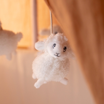 sheep detail on the musical mobile