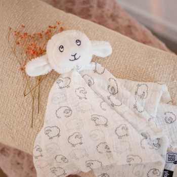 Staging of the sheep comfort toy with an all-over print on the fabric