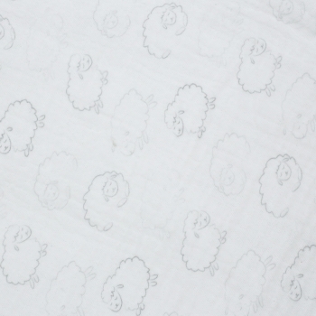 Materialzoom und Motive auf weißer Babydecke