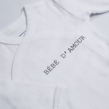 zoom opschrift op wit rompertje voor baby