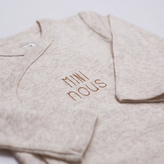 Beige baby bodysuit