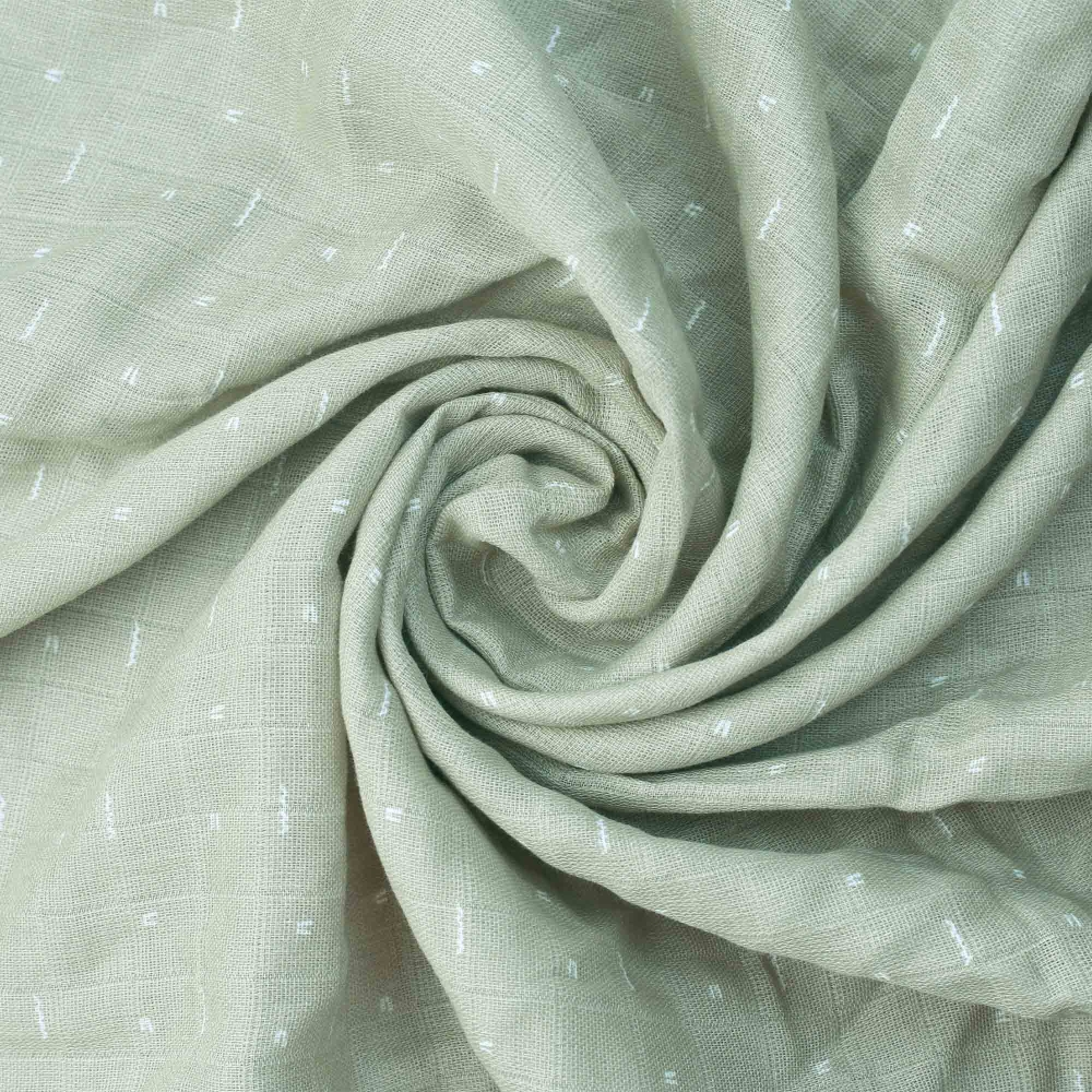 muselina bebé verde con motivo blanco