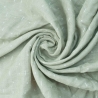 Fralda de pano verde para bebé com padrão branco