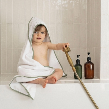 baby with hooded bath towel after bath