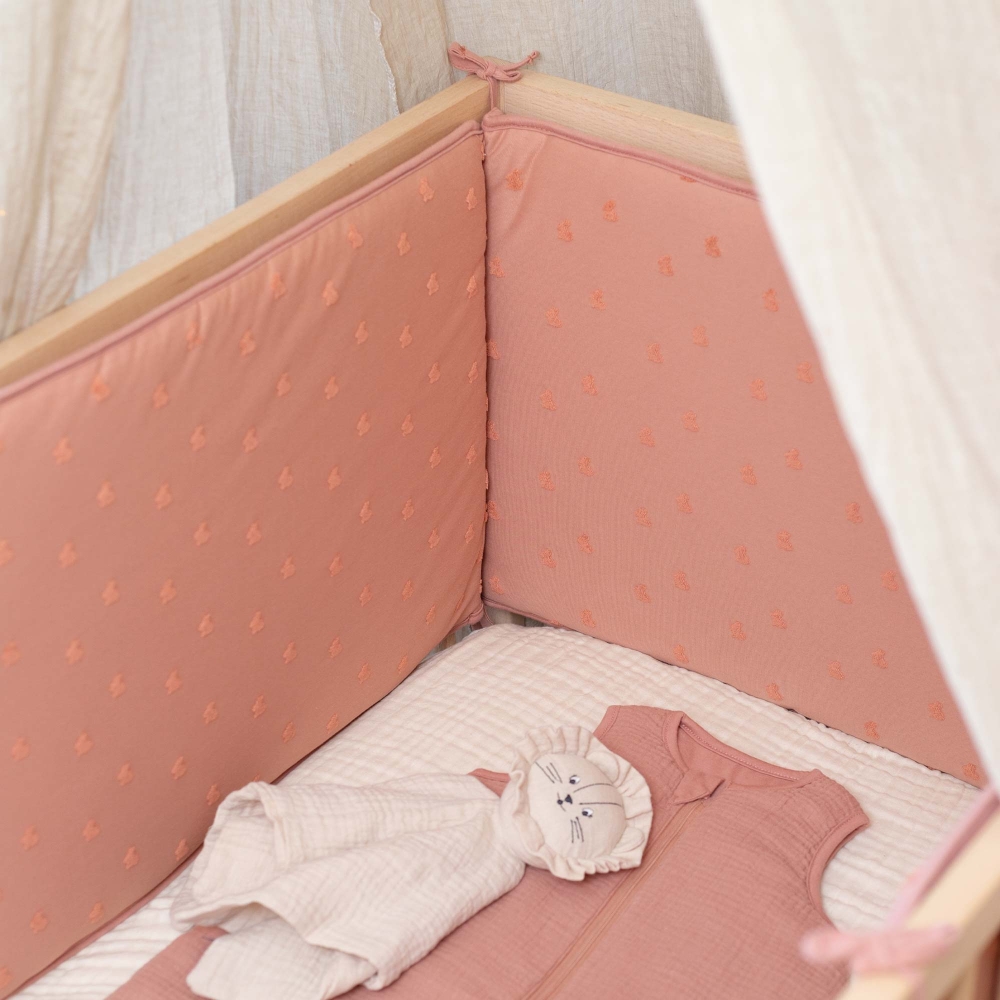 installation of high position crib bumper in baby bed