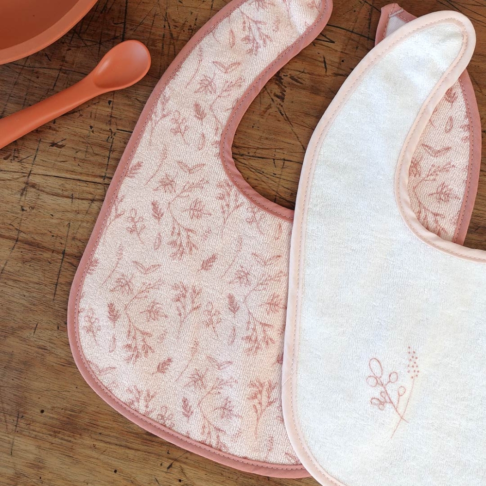 Zoom patterns bibs 1st age pink and white