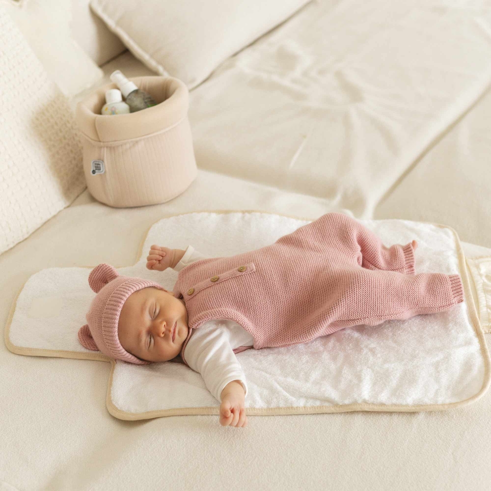 Fasciatoio portatile con bambino