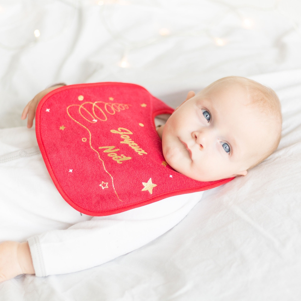Baby with Christmas bib Baby with Christmas bib