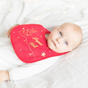 Baby with Christmas bib