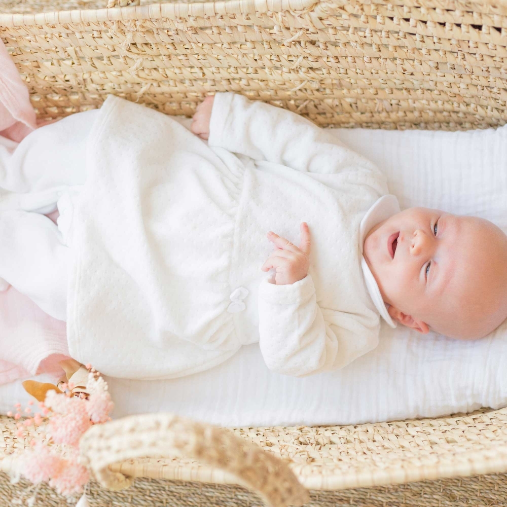 Sleeping baby in white Sophie the Giraffe dress pajama Sleeping baby in white Sophie the Giraffe dress pajama