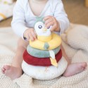 Baby sitting holding the stacking pyramid Baby sitting holding the stacking pyramid