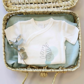 Ecru body staging in wicker basket