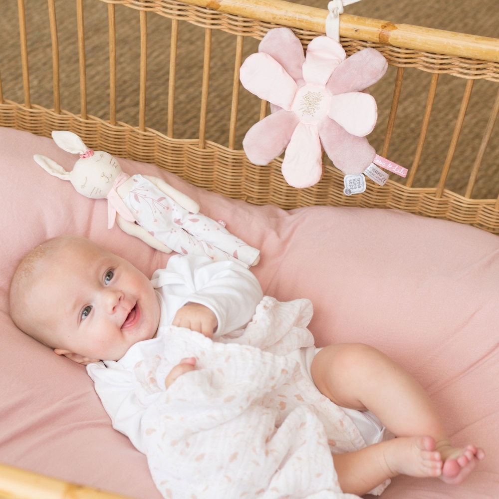 baby listening to the musical flower in his crib baby listening to the musical flower in his crib