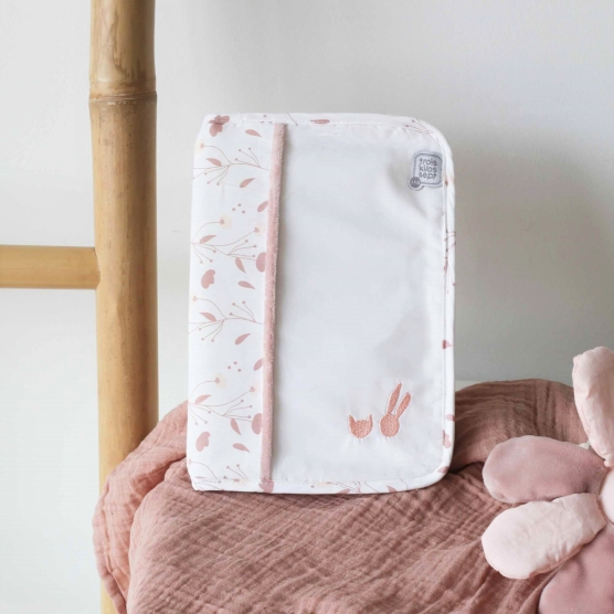 Front of the white and pink health record book cover