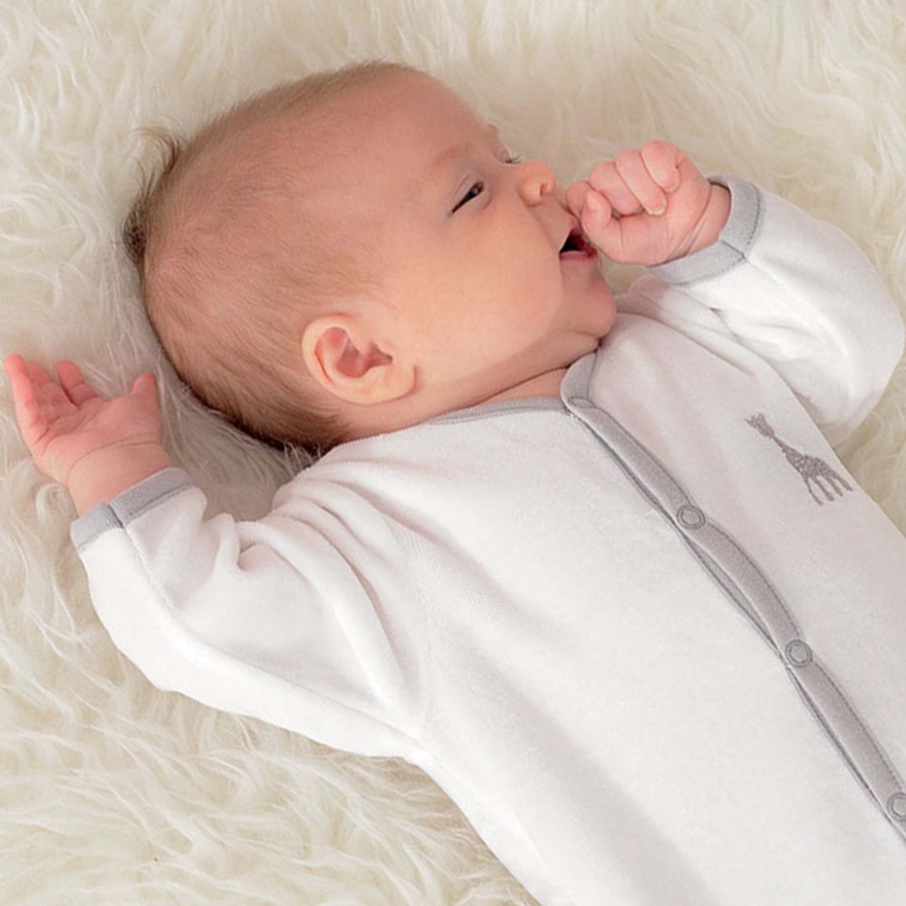 baby in white pajamas baby in white pajamas