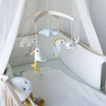 peluche musical Ao largo de Nova na cama