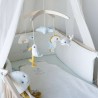 peluche musical Ao largo de Nova na cama