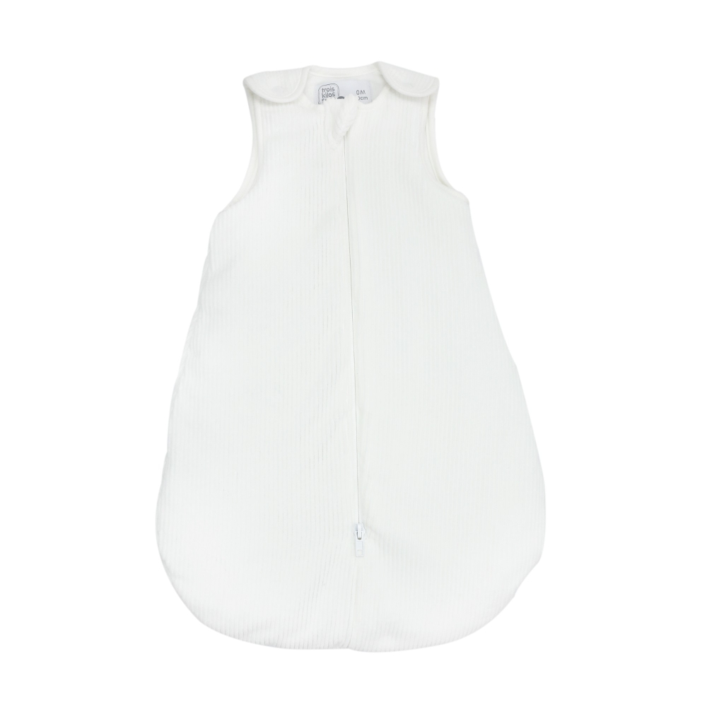 Front view of newborn sleeping bag, white corduroy