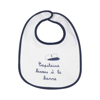 Captain Kisses bib at the helm