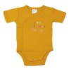 Close-up of the plain mustard bodysuit with its "I love soft kisses" inscription Close-up of the plain mustard bodysuit with its "I love soft kisses" inscription