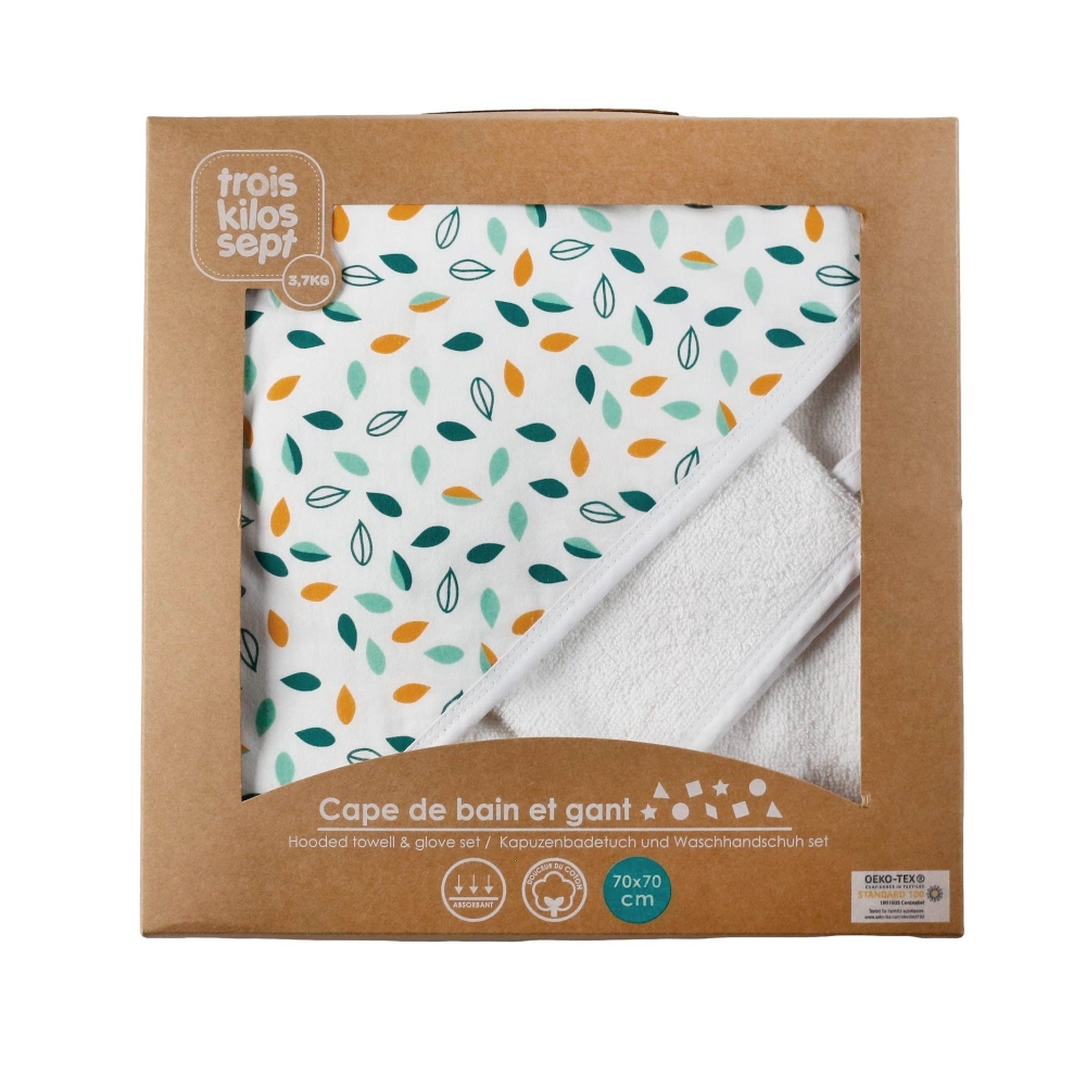 Boîte cadeau avec la cape de bain rangée dedans Boîte cadeau avec la cape de bain rangée dedans