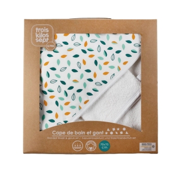 Confezione regalo con il telo da bagno riposto all'interno