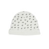 primer plano del gorro de nacimiento blanco con motivos Leopardo