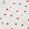 Close-up of strawberry print on baby pajamas Close-up of strawberry print on baby pajamas