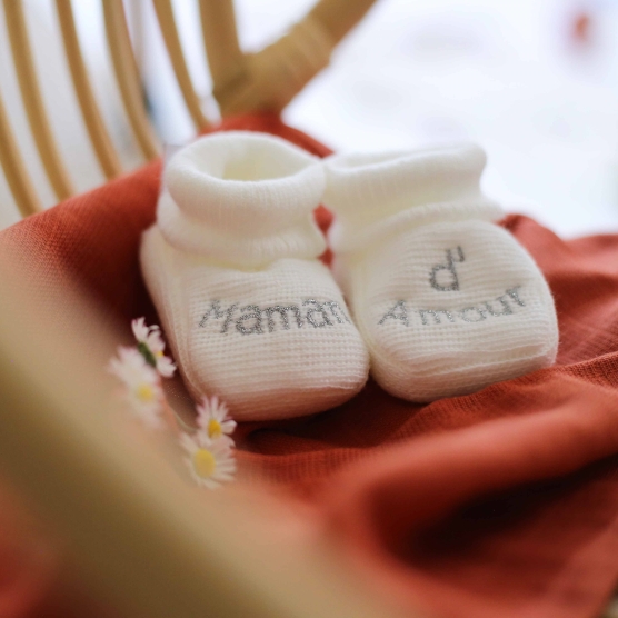 white "maman d'amour" baby booties