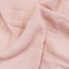 Zoom na textura da fralda de pano cor-de-rosa
