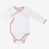 White bodysuit with pink trim and star patterns White bodysuit with pink trim and star patterns