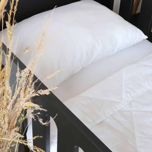 Biancheria da letto per bebè: piumino e cuscino